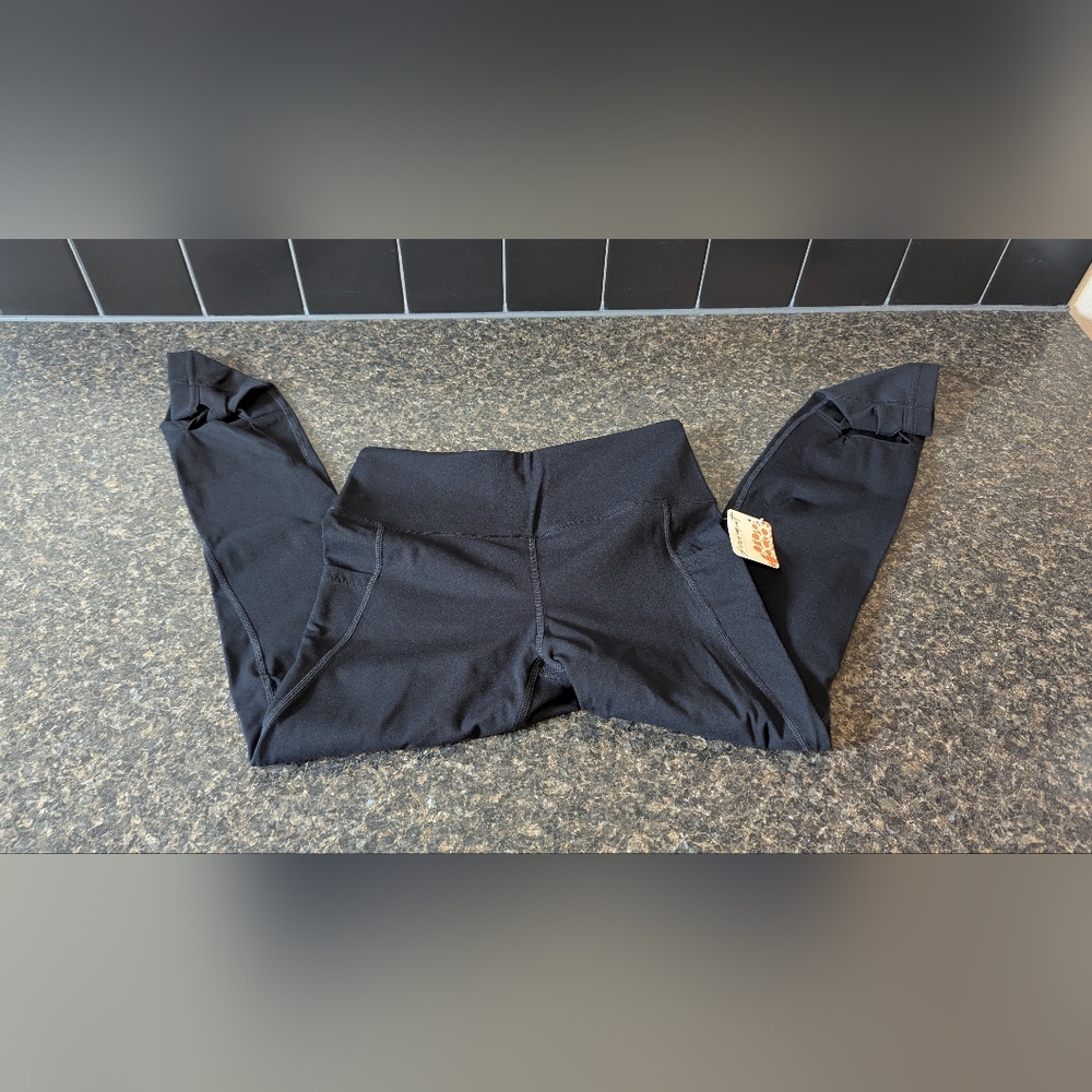 Free People movement black leggings size M Twisted Hem Pants Sporty Gym